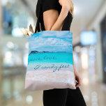 Tote Bag Peace Love Sandy Feet Hawaii Turquoise Beach Photo<br><div class="desc">"Paix, amour et pieds sablonneux." Rappelez-vous l'odeur de sel frais de l'air marin. Détendez-vous, respirez et explorez la solitude d'une plage hawaïenne vide chaque fois que vous utilisez ce sac fourre-tout photo étonnant et coloré. Faites un grand cadeau pour vous-même ou quelqu'un de spécial! Vous pouvez facilement personnaliser ce sac...</div>