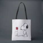 Tote Bag Peanuts | Snoopy & Woodstock Red & Black<br><div class="desc">Bring the timeless charm and heartfelt friendship of Peanuts' Snoopy and Woodstock into your life with this delightful collection, featuring their iconic red flower moment. This classic illustration captures Woodstock sweetly presenting a flower to his best pal, making every item in this collection a pure joy to own or gift!...</div>