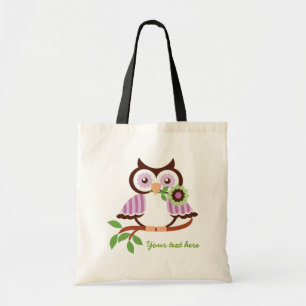 Tote Bag Petite chouette de printemps tenant une fleur dans