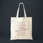 Tote Bag Pink Monogram Name Script Hobby Sports<br><div class="desc">Personalized Pink and Rose Gold Custom Monogram Name Tote Bag with editable text typography and wording with a list of her hobby interests and sports played makes a fun and useful gift for the girl on the go and in lots of extracurricular activities. This example reads "hockey, lacrosse, hiking, reading,...</div>