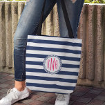 Tote Bag Preppy Nautical Navy Stripe and Pink Monogram<br><div class="desc">Le sac fourre-tout à rayures nautiques classique présente de larges bandes horizontales bleu marine et blanc avec un emblème de corde circulaire tenant votre monogramme initial en rose magenta brillant. Personnalisez avec vos initiales en utilisant les champs prévus pour un sac fourre-tout amusant et fonctionnel qui est le vôtre !...</div>