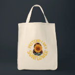Tote Bag Prétendre que je suis un tournesol mignon et drôle<br><div class="desc">Description : Fleur en style avec cette adorable chemise costume "Pretend I Am a Sunflower" ! Idéal pour les amateurs de tournesol et de nature, ce tee-shirt mignon et drôle apporte des vibes ensoleillées à Halloween ou toute journée décontractée. Une tenue parfaite pour les amoureux de les jardins, les amateurs...</div>