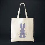 Tote Bag Purple Bunny Silhouette Pâques Personnalisé<br><div class="desc">Purple Bunny Silhouette Pâques Personalisé Enfants Chasse aux oeufs Fourre-tout. Silhouette de lapin mauve avec queues moelleuses. Personnalisez avec le nom de votre enfant dans le centre. Modifiez la couleur du texte en choisissant "personnaliser". Un fourre-tout personnalisé pour la chasse aux oeufs de Pâques, des gâteries du lapin de Pâques...</div>