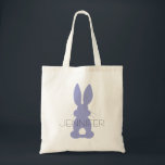 Tote Bag Purple Bunny Silhouette Pâques Personnalisé<br><div class="desc">Purple Bunny Silhouette Pâques Personalisé Enfants Chasse aux oeufs Fourre-tout. Silhouette de lapin mauve avec queues moelleuses. Personnalisez avec le nom de votre enfant dans le centre. Modifiez la couleur du texte en choisissant "personnaliser". Un fourre-tout personnalisé pour la chasse aux oeufs de Pâques, des gâteries du lapin de Pâques...</div>
