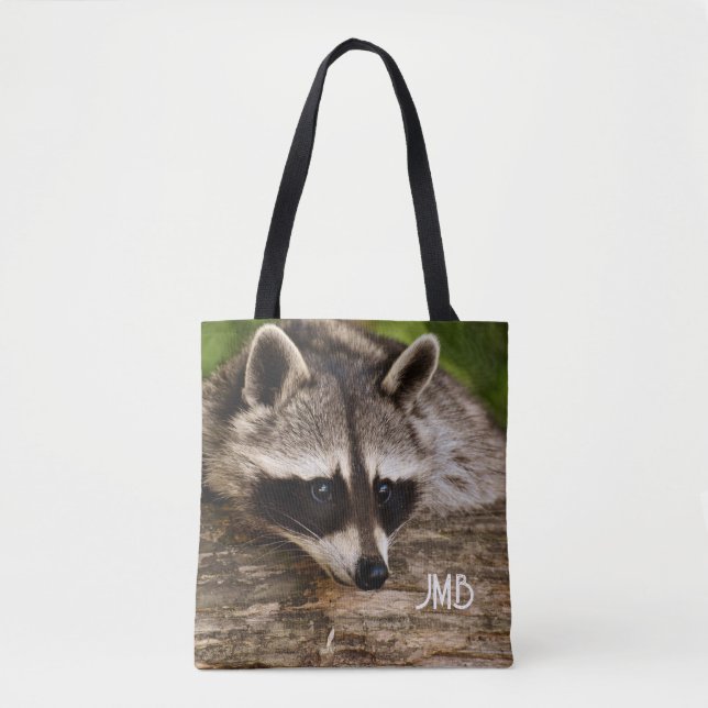 Tote Bag Raccoon mignon reposant sur un journal (Devant)