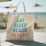 Tote Bag Rainbow Pride Manger Sleep Beach Répéter<br><div class="desc">Un sac fourre-tout d'été ludique et lumineux avec les mots "EAT SLEEP BEACH REPEAT" dans des couleurs ombres arc-en-ciel.</div>