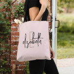 Tote Bag Rose clair monogramme<br><div class="desc">Faites une déclaration avec ce superbe monogramme noir et blanc sac fourre-tout. Ce sac élégant offre des lettres de script modernes dans un design élégant qui fera tourner les têtes partout où vous allez. Avec beaucoup de place pour vos essentiels et un style unique, ce sac est sûr de devenir...</div>