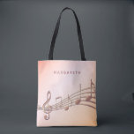 Tote Bag Rose or note musique nom du musicien<br><div class="desc">Simple et élégant pour un mélomane ou un musicien ! arrière - plan rose dégradé or avec notes de musique rose or. Modèle pour votre nom,  écriture manuscrite de style.</div>