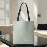 Tote Bag Sage Green Minimaliste Moderne Monogramme Élégant<br><div class="desc">Découvrez notre collection moderne minimaliste de monogramme Sage Green : Élégez votre esthétique avec une sophistication sereine et une élégance intemporelle. Notre collection présente des designs minimalistes dans une teinte verte sage et tranquille, complétés par des monogrammes raffinés adaptés à votre style personnel. De la papeterie polie aux accessoires polyvalents,...</div>