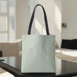 Tote Bag Sage Green Minimaliste Moderne Monogramme Élégant<br><div class="desc">Découvrez notre collection moderne minimaliste de monogramme Sage Green : Élégez votre esthétique avec une sophistication sereine et une élégance intemporelle. Notre collection présente des designs minimalistes dans une teinte verte sage et tranquille, complétés par des monogrammes raffinés adaptés à votre style personnel. De la papeterie polie aux accessoires polyvalents,...</div>