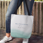 Tote Bag Seaglass Tides Destination Mariage<br><div class="desc">Accueillez vos invités de mariage de destination avec notre sac fourre-tout personnalisé. Un choix parfait pour les sacs de bienvenue ou les faveurs mariages, fourre-tout coordonne avec notre collection d'invitation Seaglass Tides et dispose d'un lavage d'aquarelle rêveur au fond en vert pur seaglass. Ajoutez les noms du couple, la date...</div>