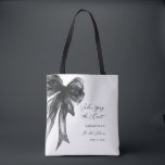 Tote Bag She’s Tying The Knot Black Bow Bridal Shower<br><div class="desc">Celebrate the bride-to-be with this She’s Tying The Knot Black Bow Bridal Shower Tote Bag, designed with a chic coquette-inspired black bow and elegant modern typography. Perfect for bridal showers, bachelorette celebrations, and wedding events, this stylish tote makes a thoughtful gift for the bride, bridesmaids, or guests. Ideal as a...</div>