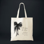 Tote Bag She’s Tying The Knot Black Bow Bridal Shower<br><div class="desc">Celebrate the bride-to-be with this She’s Tying The Knot Black Bow Bridal Shower Tote Bag, designed with a chic coquette-inspired black bow and elegant modern typography. Perfect for bridal showers, bachelorette celebrations, and wedding events, this stylish tote makes a thoughtful gift for the bride, bridesmaids, or guests. Ideal as a...</div>