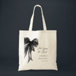 Tote Bag She’s Tying The Knot Black Bow Bridal Shower<br><div class="desc">Celebrate the bride-to-be with this She’s Tying The Knot Black Bow Bridal Shower Tote Bag, designed with a chic coquette-inspired black bow and elegant modern typography. Perfect for bridal showers, bachelorette celebrations, and wedding events, this stylish tote makes a thoughtful gift for the bride, bridesmaids, or guests. Ideal as a...</div>
