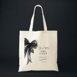 Tote Bag She’s Tying The Knot Black Bow Bridal Shower<br><div class="desc">Celebrate the bride-to-be with this She’s Tying The Knot Black Bow Bridal Shower Tote Bag, designed with a chic coquette-inspired black bow and elegant modern typography. Perfect for bridal showers, bachelorette celebrations, and wedding events, this stylish tote makes a thoughtful gift for the bride, bridesmaids, or guests. Ideal as a...</div>