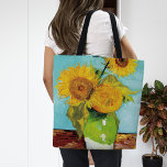 Tote Bag Trois tournfleurs | Vincent Van Gogh<br><div class="desc">Three Sunflowers (1888) de l'artiste néerlandais Vincent Van Gogh. Un tableau d'art original est une huile sur toile représentant une vie morte de tournesols jaune vif contre un arrière - plan turquoise. Utilisez les outils de conception pour ajouter du texte personnalisé ou personnaliser l'image.</div>