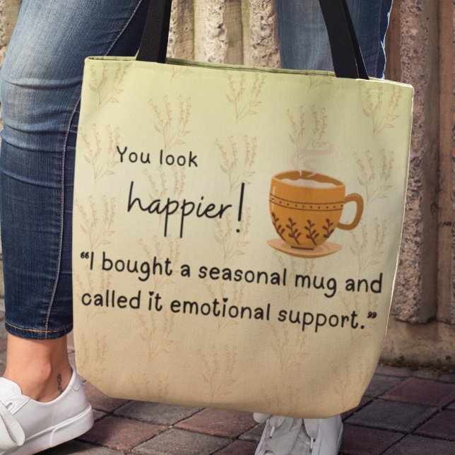 Tote Bag Tu as l'air plus heureux ! "J'ai acheté une tasse  ("You look happier! "I bought a seasonal mug and called it emotional support" tote bag)