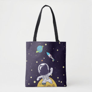 Tote Bag Un astronaute spatial flotte dans l'espace