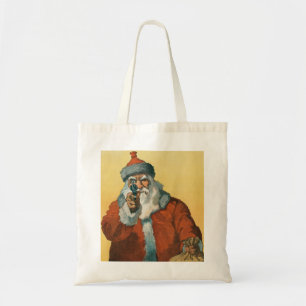 Tote Bag Un drôle de Père Noël avec un revolver de Noël