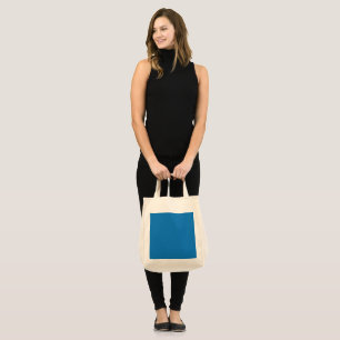 Tote Bag un fond bleu avec une horloge noir et blanc