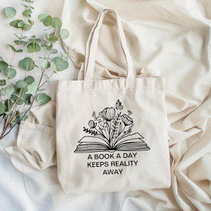 Tote Bag Un livre par jour garde la réalité loin du design