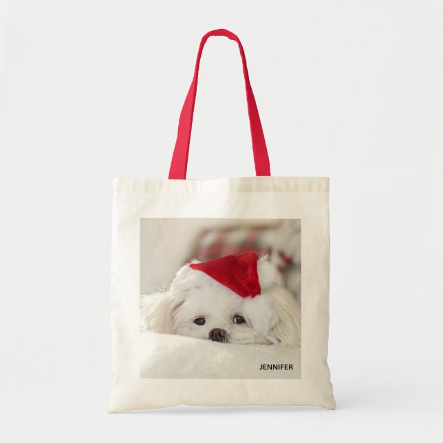 Tote Bag Un mignon chien blanc dans un Casquette de Noël ro (Devant)