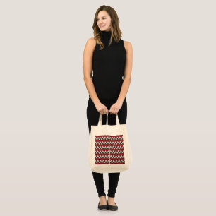 Tote Bag un motif en zigzag rouge et noir sur fond blanc