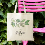 Tote Bag Une verdure personnalisée<br><div class="desc">Ce sac fourre-tout personnalisé est décoré de feuillage d'aquarelle botanique dans les tons verts. Facilement personnalisable avec votre nom et monogramme. Aquarelle originale © Michele Davies.</div>