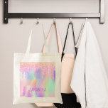 Tote Bag Unicorn parties scintillant goutte rose violet nom<br><div class="desc">Un arrière - plan tendance aux couleurs arc-en-ciel aux couleurs pastel unicorne et arc-en-ciel rose, violet, or rose, vert menthe. Décoré avec des gouttes de parties scintillant en or rose, rose et violet. Une licorne de couleur arc-en-ciel. Personnalisez et ajoutez un nom, écrit avec un script de style à la...</div>
