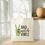 Tote Bag Vibes de sorcières maladroites Halloween moderne<br><div class="desc">Portez vos essentiels avec style avec notre Bad Witch Vibes Sac fourre-tout d'Halloween moderne ! Doté d'un design noir épuré avec l'expression audacieuse "Bad Witch Vibes" dans la typographie moderne, ce fourre-tout est parfait pour ajouter une touche d'élégance éffrayante à votre quotidien. Fabriqué avec des matériaux durables et de qualité,...</div>