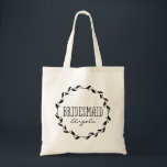 Tote Bag Whimsical Wreath  Custom Bridesmaid Wedding Tote<br><div class="desc">Beautiful design for chic wedding party, bridal party or bachelorrette parties.This personalized tote bag features the bridesmaid's name inside a whimsical wreath/laurel.Thank your bridal party with these chic custom tote bags. Personalize each bag with the recipient's name and fill it her favorite things as a gift bag. Your wedding attendants...</div>