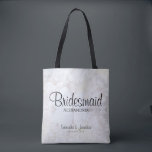 Tote Bag White Peony Flowers & Hearts Bridesmaid Mariage<br><div class="desc">Ce beau sac fourre-tout est parfait pour remercier vos demoiselles d'honneur. Il présente un script noir moderne en lettrage sur un arrière - plan de reflet des fleurs et des coeurs de pivoines blanches. Le texte est entièrement personnalisable et dit : Bridesmaid, avec un endroit pour son nom, les noms...</div>
