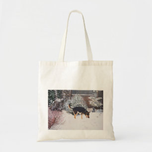Tote Bag Winter snow scene with cute black and tan dog