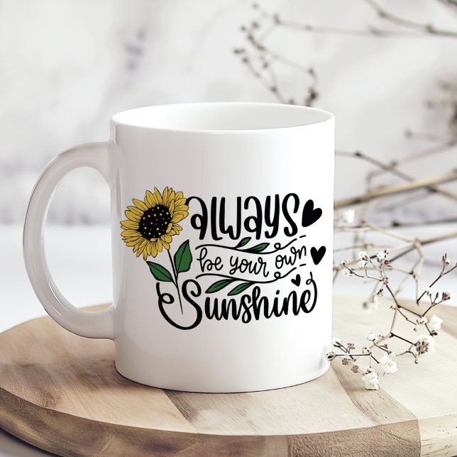 Toujours être ton propre tournesol Mug soleil ("Always Be Your Own Sunshine" Sunflower Quote Coffee Mug on a boho kitchen table with tiny flowers)