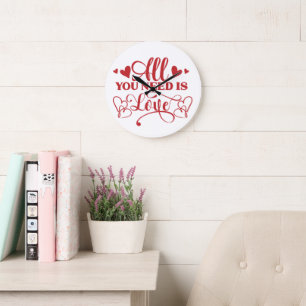 Tout ce dont vous avez besoin est l'amour Horloge