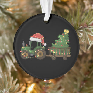 Tracteur de Noël avec agriculteur d'arbre de ferme