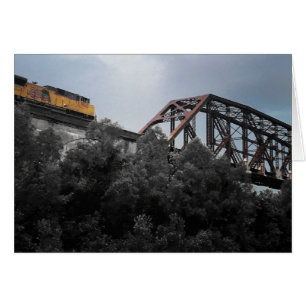train de locomotives traversant le pont thebes