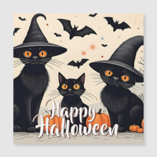 Trois chats noirs avec des chapeaux pour Halloween