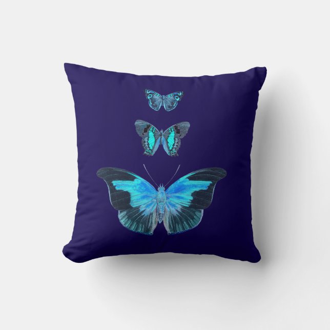 Trois papillons bleus sur un oreiller bleu foncé (Recto)