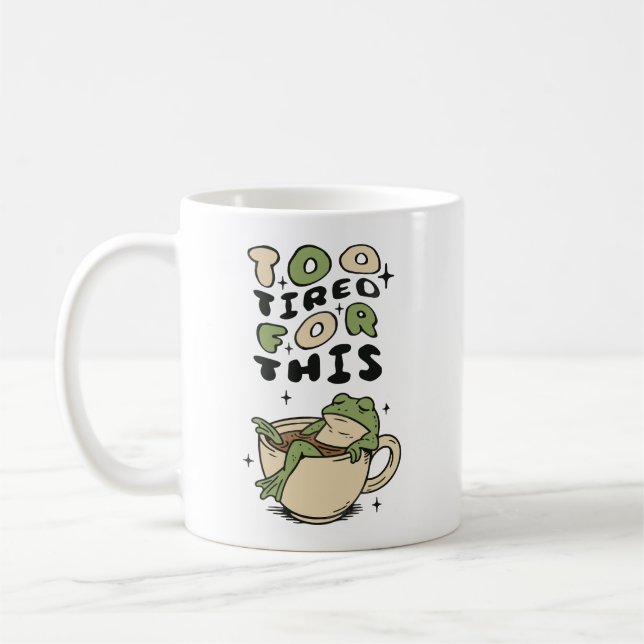 Trop fatigué pour cette grenouille dans une tasse  (Gauche)