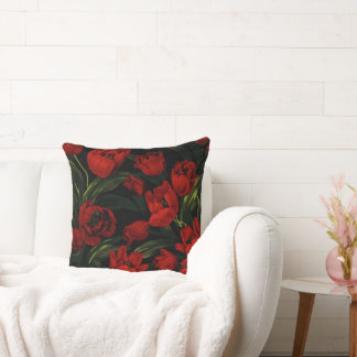 Tulipes rouges sur oreiller noir