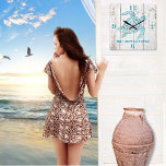 Turtle Beach House Bois Look Horloge murale<br><div class="desc">Elégante horloge murale style maison de plage, avec des graphiques d'un arrière - plan en bois défoncé lavé blanc et de beaux graphismes bleu aqua d'une tortue de mer décorative. Les numéros gras bleu aqua indiquent 12, 3, 6 et 9 heures. Personnalisez le texte bleu aqua selon vos besoins. Ça...</div>