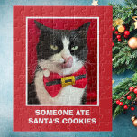 Tuxedo Cat Red Christmas Puzzle<br><div class="desc">Ce mignon puzzle de Noël de chat en smoking présente une photo d'un chat en smoking avec sa langue en portant un arc de Noël. En dessous de la photo se trouvent les mots, "Quelqu'un a mangé des cookies Père Noël." C'est un grand casse-tête pour l'amoureux des chats. Copyright peachesthetuxedocat...</div>