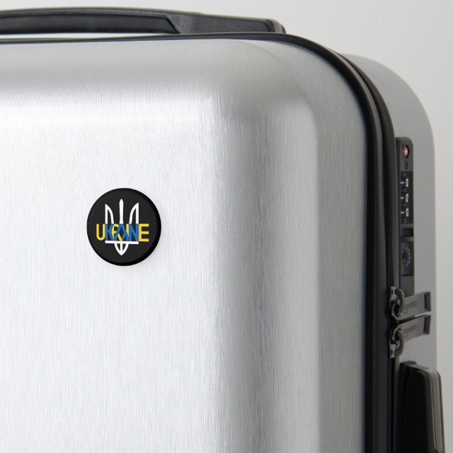 Un aimant inspirant avec l'inscription "Ukraine" (In Situ (Bagages))