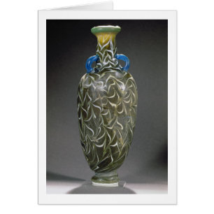 Un amphora noyau-formé avec des motifs de vague,