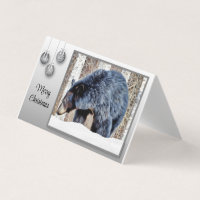 Un bel ours noir dans la neige.