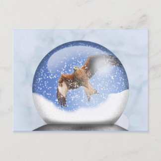 Un cerf-volant rouge dans une carte postale du mon