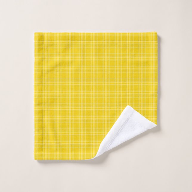Un ensemble de serviettes à carreaux jaune vif sur (Gant de toilette)