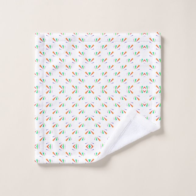Un ensemble de serviettes de bain exposé sur un mu (Gant de toilette)