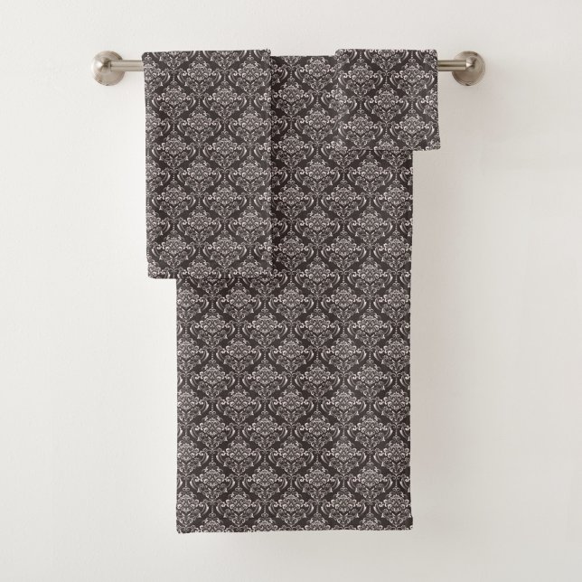 Un ensemble de serviettes de bain sur un porte-ser (Créateur téléchargé)